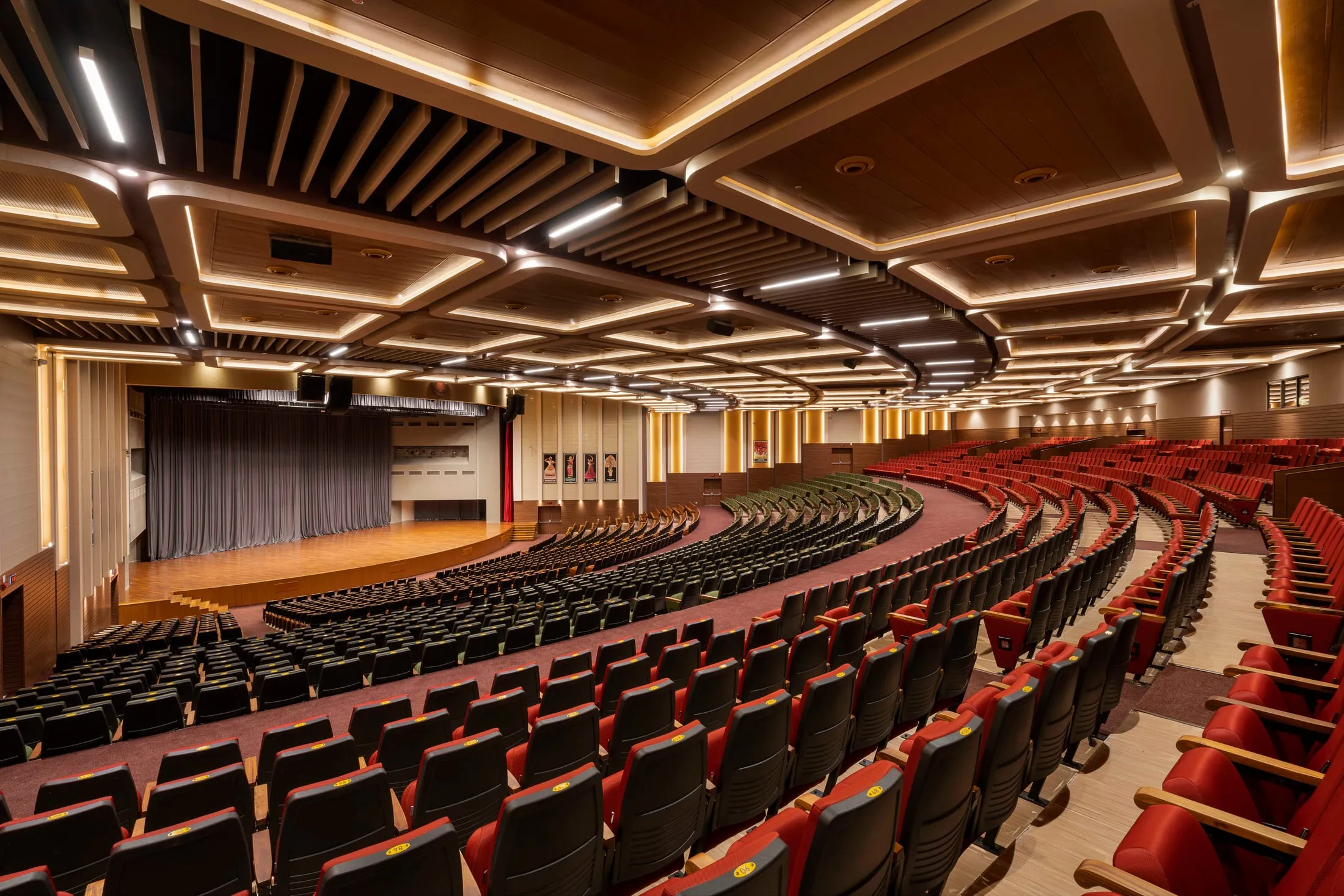 The 2,500-seat RSET auditorium with fan-shaped rows of red seats