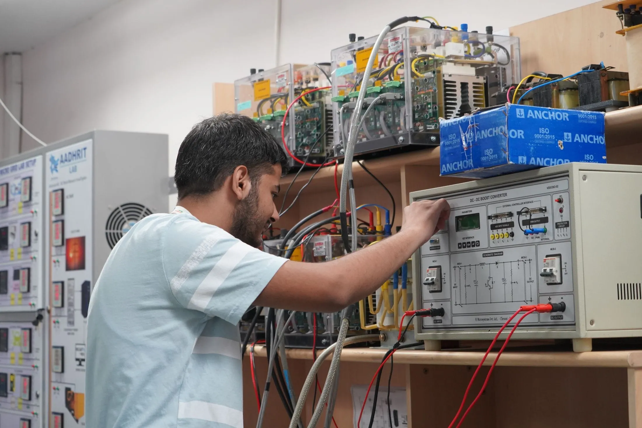 Young engineer adjusting equipment in a research laboratory